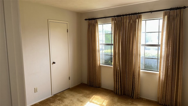 918 Maydelle Ln, Garland, TX 75042 - unfurnished room with carpet flooring