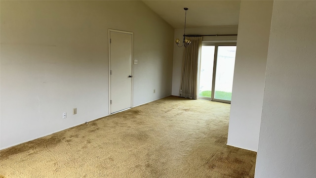918 Maydelle Ln, Garland, TX 75042 - empty room with a chandelier, carpet, and lofted ceiling