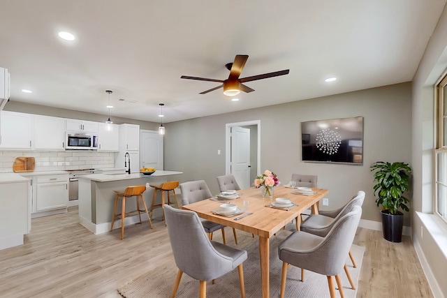 9726 Cushing Dr, Dallas, TX 75217 - dining area featuring light wood-type flooring, recessed lighting, a ceiling fan, and baseboards
