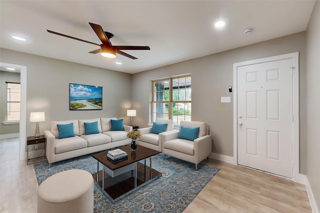 9726 Cushing Dr, Dallas, TX 75217 - living room with ceiling fan, light wood-style floors, baseboards, and recessed lighting