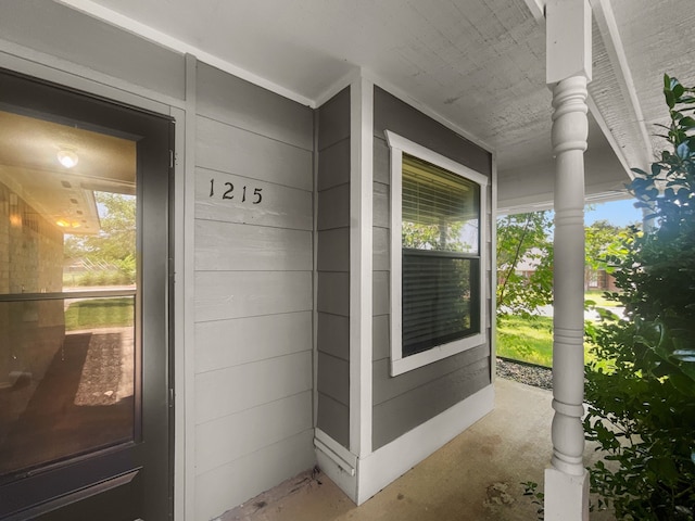1215 Keechi St, Weatherford, TX 76086 - doorway to property featuring covered porch
