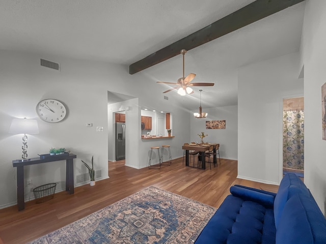 1215 Keechi St, Weatherford, TX 76086 - living area with wood finished floors, a ceiling fan, and baseboards