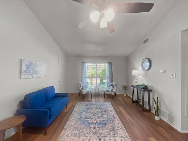 1215 Keechi St, Weatherford, TX 76086 - living area with ceiling fan, wood finished floors, vaulted ceiling, and baseboards