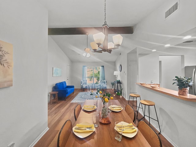 1215 Keechi St, Weatherford, TX 76086 - dining space featuring wood finished floors, a ceiling fan, baseboards, and a chandelier