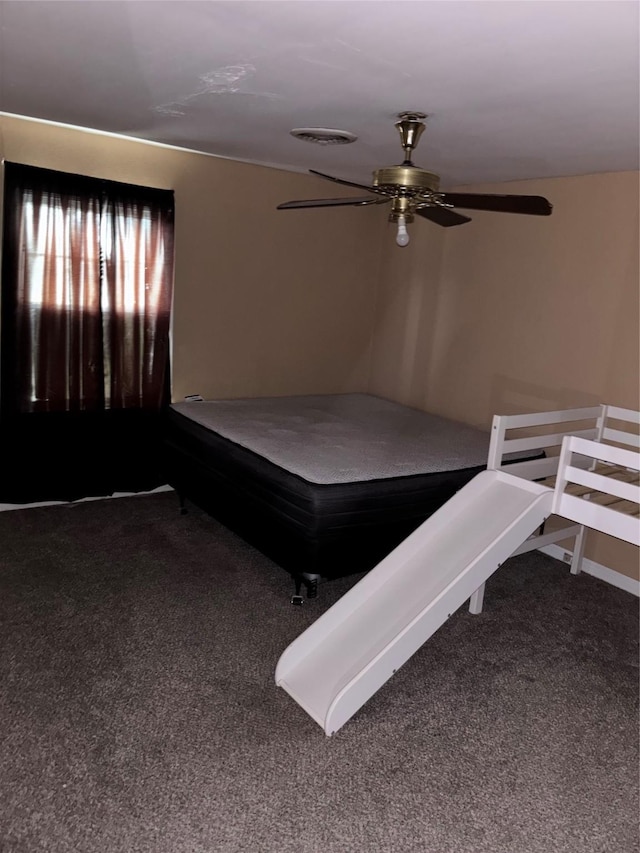 105 Philview St, Borger, TX 79007 - bedroom featuring dark carpet, ceiling fan, and billiards