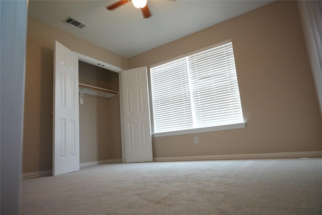 8300 Charleston St, Irving, TX 75063 - unfurnished bedroom with carpet floors, a closet, baseboards, and a ceiling fan