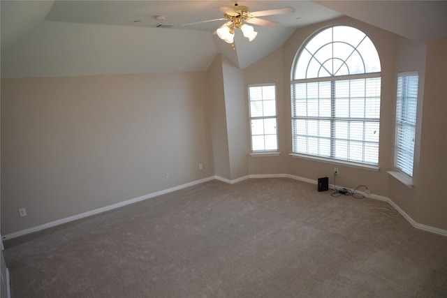 8300 Charleston St, Irving, TX 75063 - carpeted empty room with a ceiling fan, plenty of natural light, vaulted ceiling, and baseboards