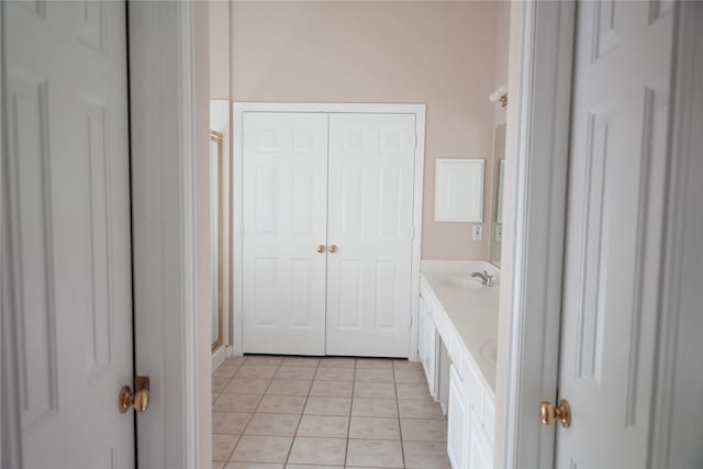 8300 Charleston St, Irving, TX 75063 - full bathroom featuring tile patterned floors, double vanity, and a shower stall