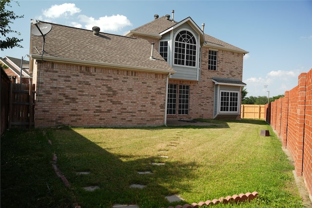 8300 Charleston St, Irving, TX 75063 - rear view of house featuring brick siding and a shingled roof