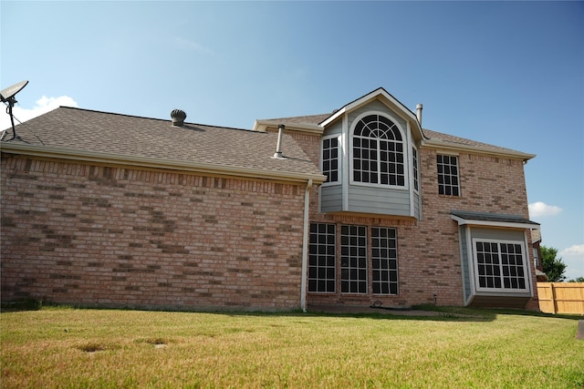 8300 Charleston St, Irving, TX 75063 - rear view of property featuring brick siding and a shingled roof