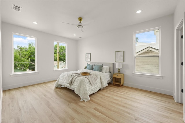 1336 Compton St, Dallas, TX 75203 - bedroom featuring light wood-style flooring, baseboards, recessed lighting, and a ceiling fan