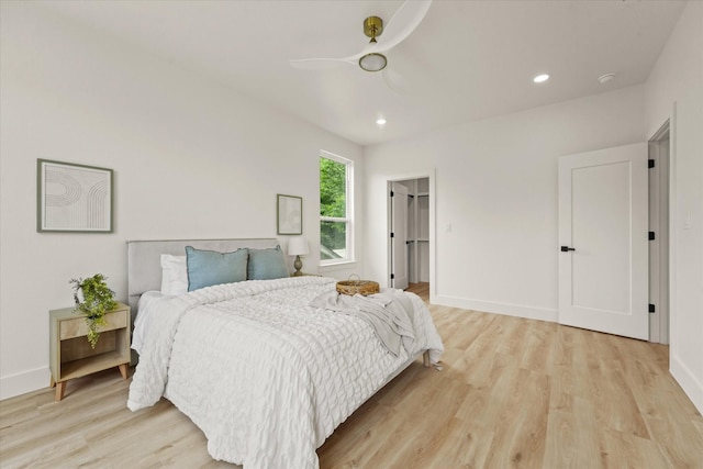 1336 Compton St, Dallas, TX 75203 - bedroom featuring light wood-style flooring, a ceiling fan, recessed lighting, baseboards, and a spacious closet
