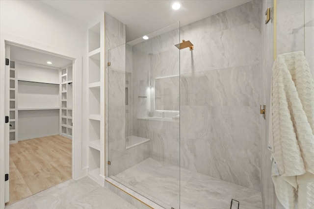 1336 Compton St, Dallas, TX 75203 - full bath with a spacious closet, a marble finish shower, and recessed lighting