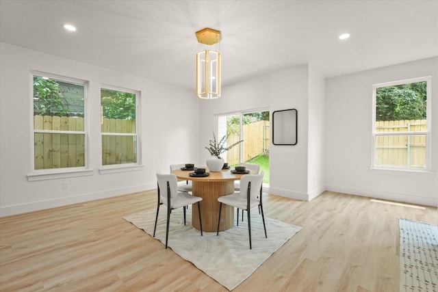 1336 Compton St, Dallas, TX 75203 - dining area featuring baseboards, light wood-style floors, and recessed lighting