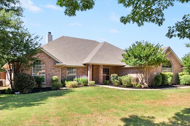 10208 W Rancho Diego Ln, Fort Worth, TX 76036 - view of front facade with brick siding, a chimney, a front lawn, a shingled roof, and cooling unit