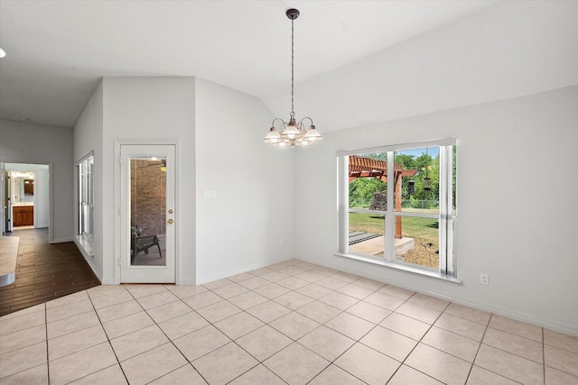 10208 W Rancho Diego Ln, Fort Worth, TX 76036 - unfurnished dining area featuring a chandelier, lofted ceiling, baseboards, and light tile patterned flooring