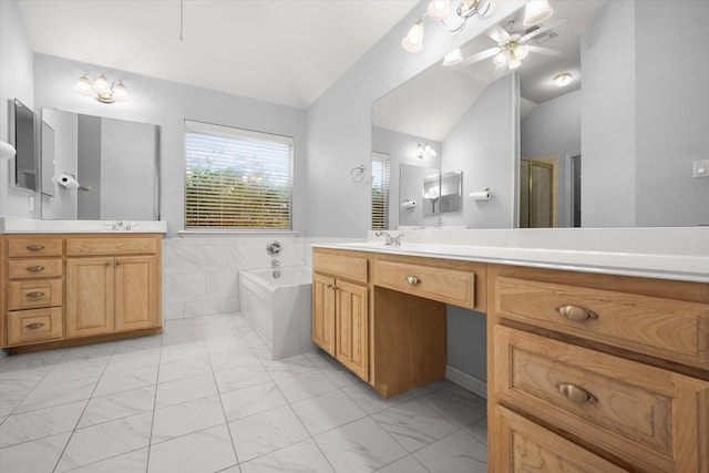 10208 W Rancho Diego Ln, Fort Worth, TX 76036 - full bath with vaulted ceiling, marble look tiles, a garden tub, ceiling fan, and vanity