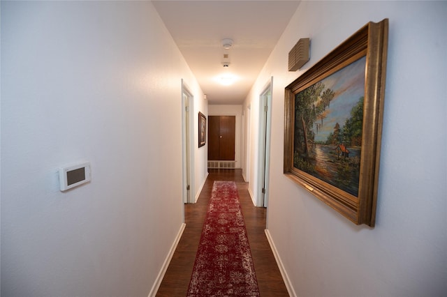 4458 Cardiff Ave, Fort Worth, TX 76133 - corridor with baseboards and dark wood-style flooring