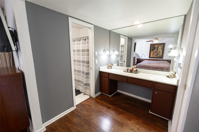 4458 Cardiff Ave, Fort Worth, TX 76133 - full bathroom with wood finished floors, ensuite bath, ceiling fan, baseboards, and vanity