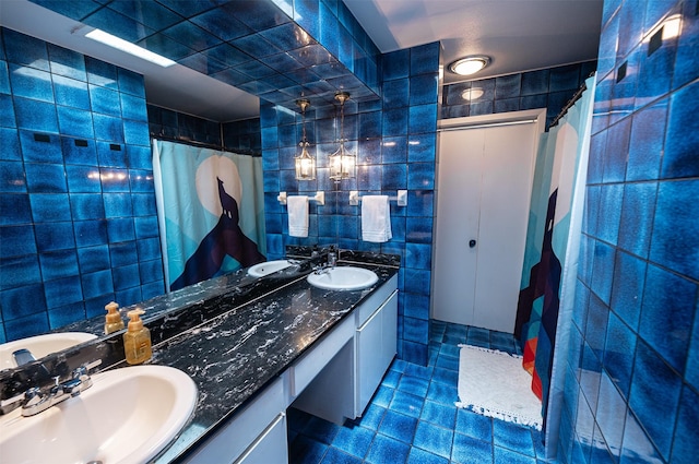 4458 Cardiff Ave, Fort Worth, TX 76133 - full bath with tile walls, double vanity, a shower with shower curtain, and tile patterned floors
