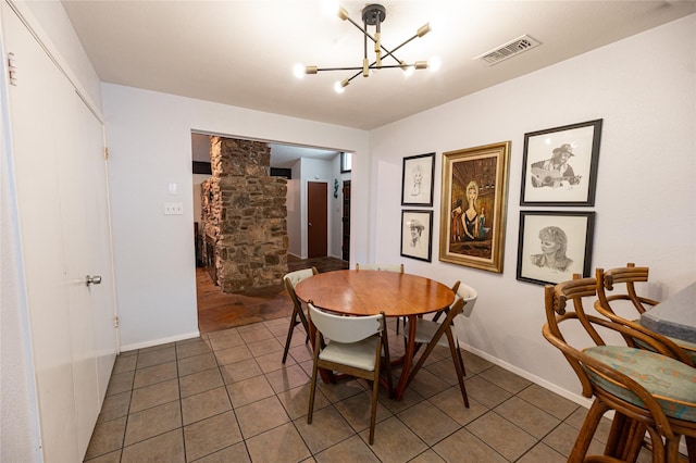 4458 Cardiff Ave, Fort Worth, TX 76133 - tiled dining space with a chandelier and baseboards