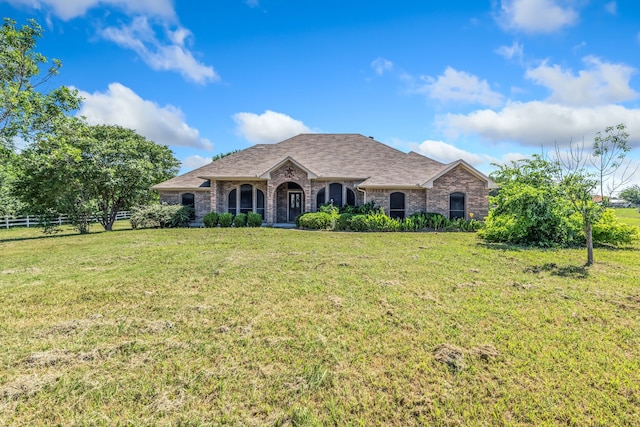 5282 Homeplace Ln, Kaufman, TX 75142 - french country style house with a shingled roof and brick siding