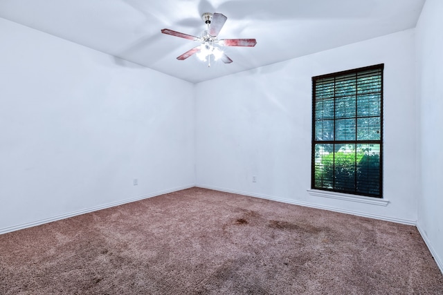 5282 Homeplace Ln, Kaufman, TX 75142 - empty room featuring carpet flooring, ceiling fan, and baseboards