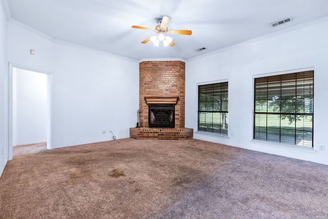5282 Homeplace Ln, Kaufman, TX 75142 - unfurnished living room with ornamental molding, carpet floors, a ceiling fan, and a brick fireplace