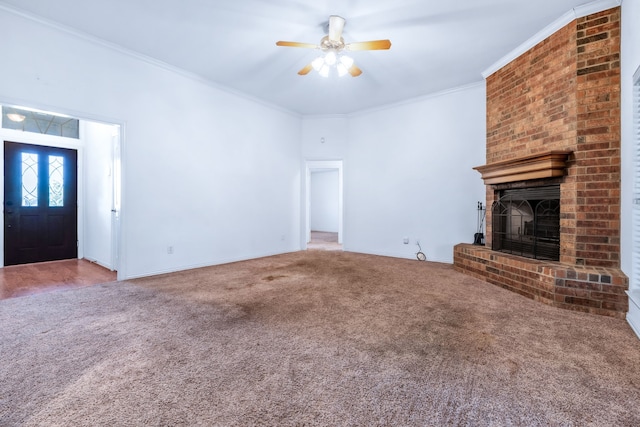 5282 Homeplace Ln, Kaufman, TX 75142 - unfurnished living room with carpet, ceiling fan, a fireplace, baseboards, and ornamental molding