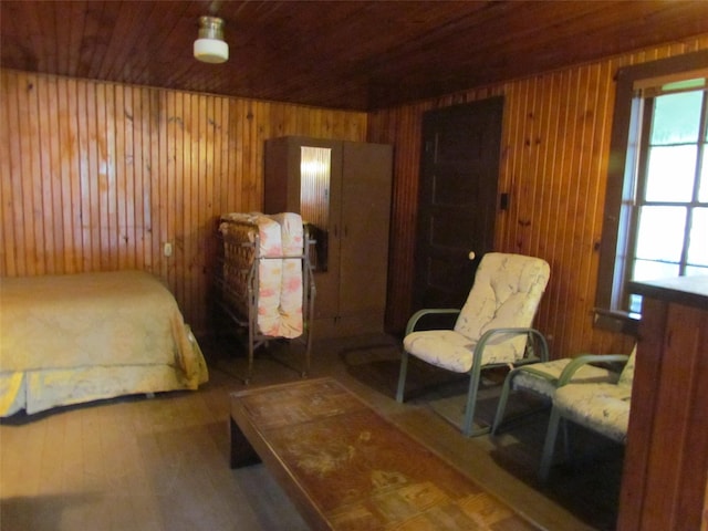 150 County Road 1699, Alba, TX 75410 - bedroom with wood walls, wooden ceiling, and wood finished floors