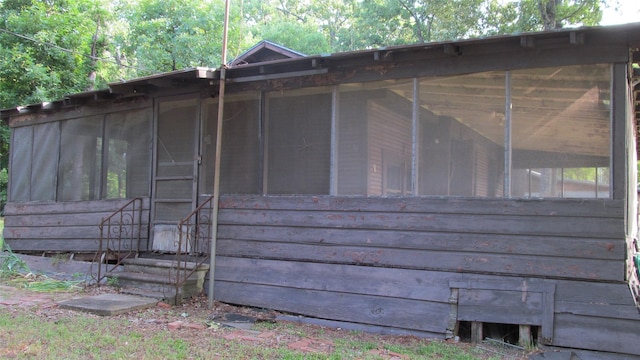 150 County Road 1699, Alba, TX 75410 - view of side of property with a sunroom