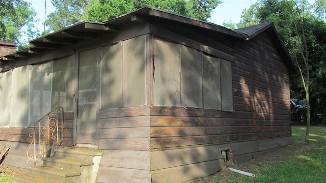 150 County Road 1699, Alba, TX 75410 - view of side of property with a sunroom