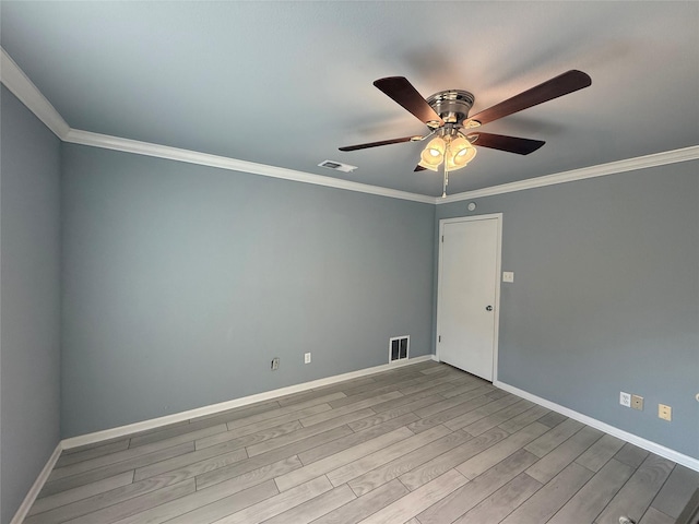 1111 Joel St, Groesbeck, TX 76642 - unfurnished room featuring a ceiling fan, wood finished floors, and crown molding