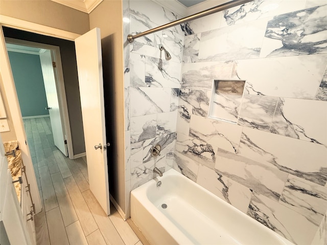 1111 Joel St, Groesbeck, TX 76642 - full bathroom featuring ornamental molding, shower / tub combination, and wood finished floors