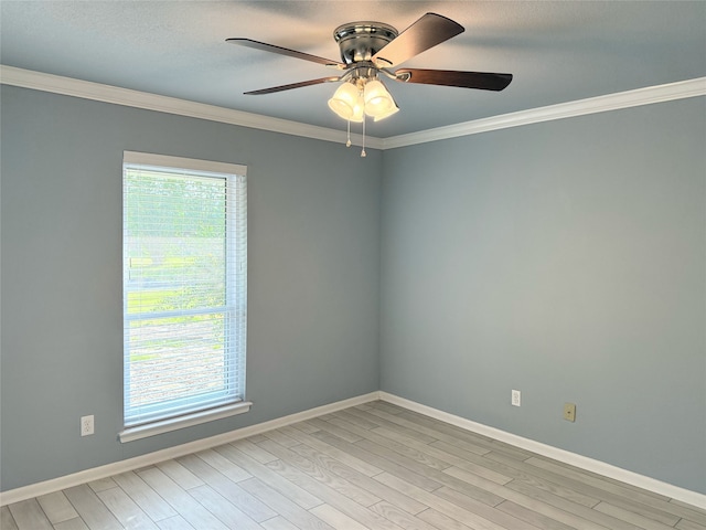 1111 Joel St, Groesbeck, TX 76642 - unfurnished room with ornamental molding, ceiling fan, and light wood-type flooring