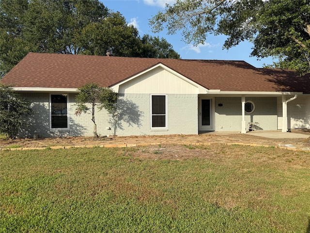 1111 Joel St, Groesbeck, TX 76642 - single story home with a front lawn, brick siding, and a shingled roof