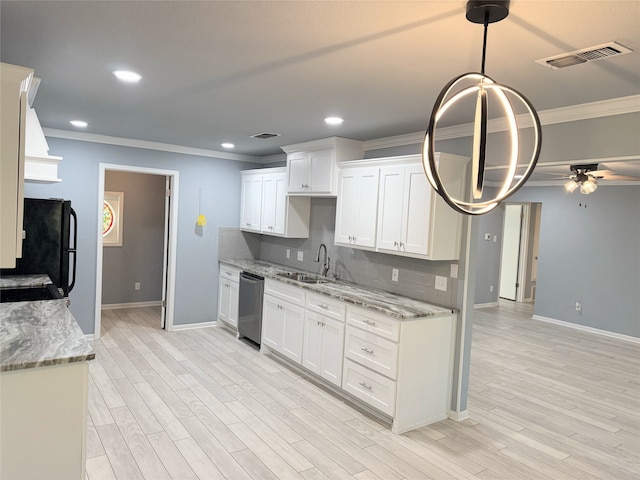 1111 Joel St, Groesbeck, TX 76642 - kitchen featuring crown molding, dishwasher, a ceiling fan, white cabinetry, and light wood-style flooring