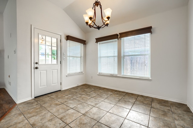 429 Creekwood Ct, Forney, TX 75126 - unfurnished dining area featuring a chandelier, vaulted ceiling, light tile patterned flooring, and baseboards