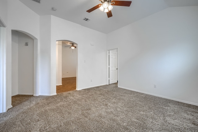 429 Creekwood Ct, Forney, TX 75126 - spare room with a ceiling fan, arched walkways, carpet flooring, baseboards, and high vaulted ceiling