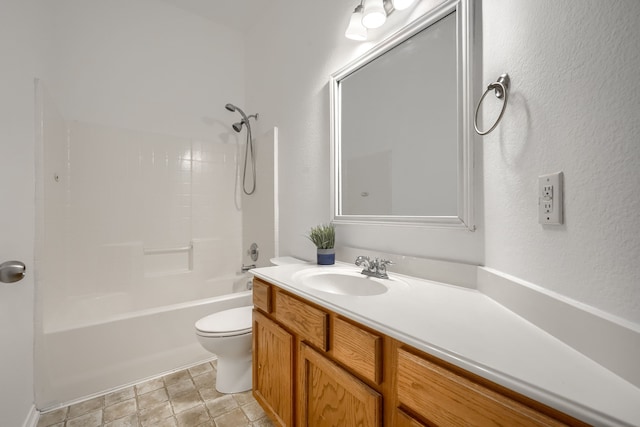 429 Creekwood Ct, Forney, TX 75126 - full bathroom featuring toilet, vanity, shower / washtub combination, and a textured wall