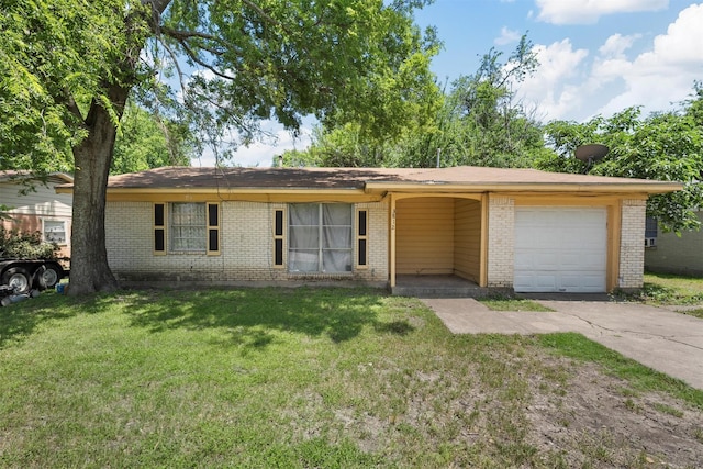 3812 Acree St, Beverly Hills, TX 76711 - single story home with brick siding, a front yard, driveway, and a garage