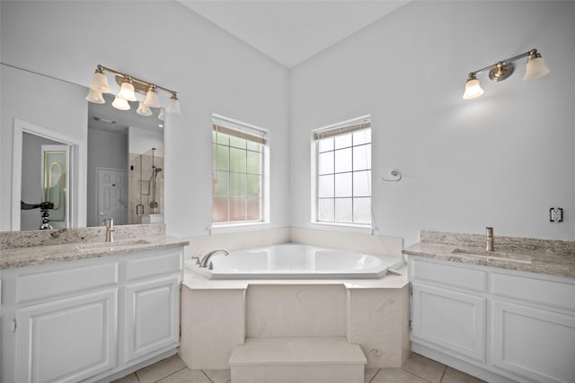 12020 Younger Ct, Azle, TX 76020 - bathroom with two vanities, a stall shower, a garden tub, and tile patterned flooring