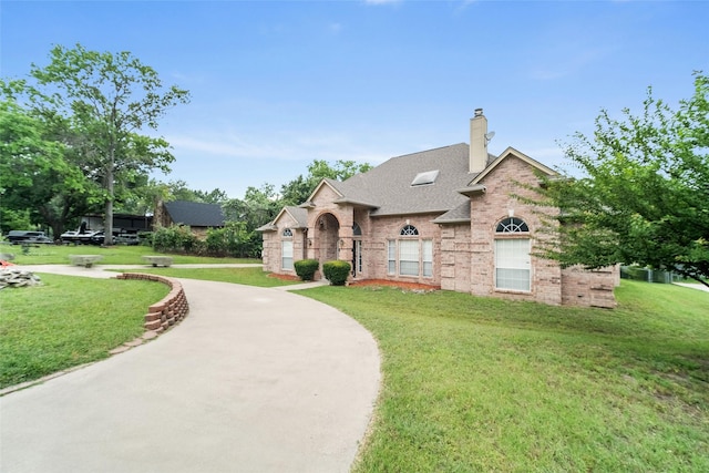 12020 Younger Ct, Azle, TX 76020 - french provincial home featuring brick siding, a front yard, a chimney, and roof with shingles
