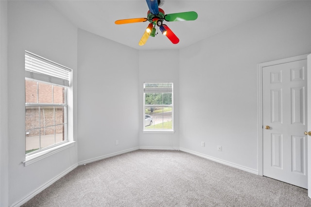 12020 Younger Ct, Azle, TX 76020 - spare room featuring carpet, baseboards, and a ceiling fan