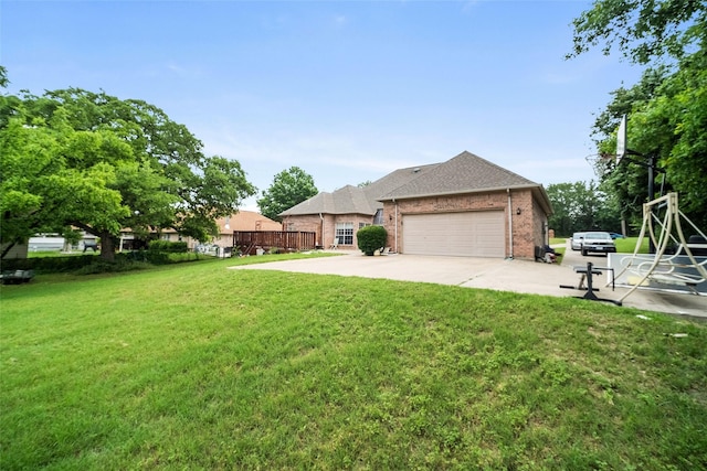 12020 Younger Ct, Azle, TX 76020 - view of grassy yard featuring a garage and concrete driveway