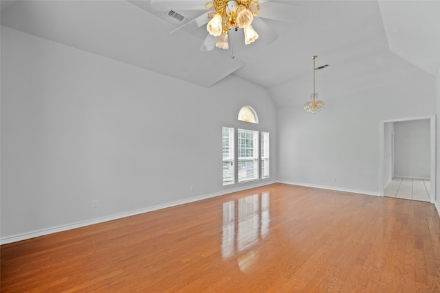12020 Younger Ct, Azle, TX 76020 - empty room with a ceiling fan, light wood-style flooring, baseboards, and high vaulted ceiling