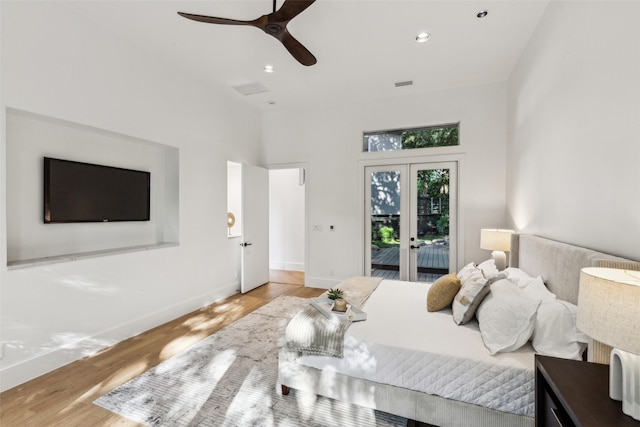 6617 Shady Creek Cir, Plano, TX 75024 - bedroom with access to exterior, wood finished floors, french doors, baseboards, and recessed lighting