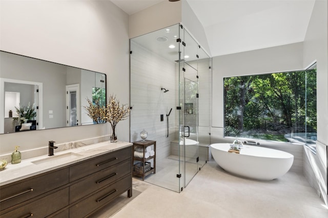 6617 Shady Creek Cir, Plano, TX 75024 - full bathroom with a shower stall, a freestanding tub, vanity, and tile patterned floors