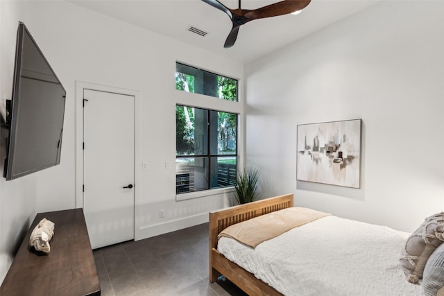 6617 Shady Creek Cir, Plano, TX 75024 - tiled bedroom featuring a ceiling fan