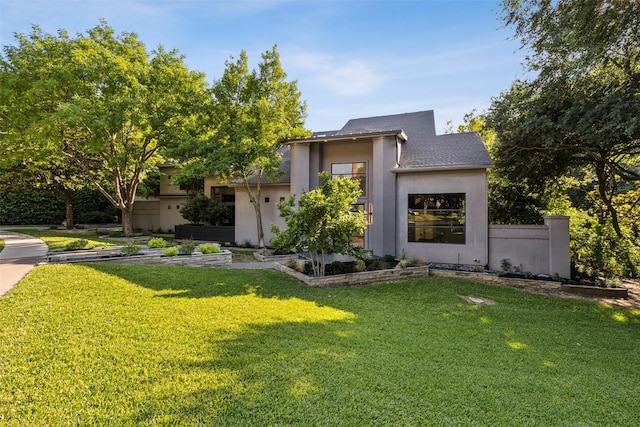 6617 Shady Creek Cir, Plano, TX 75024 - modern home with stucco siding and a front lawn
